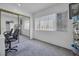 Comfortable bedroom with mirrored closet and natural light from the large window at 45 Prince Ln, Las Vegas, NV 89110