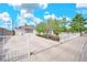 Inviting single-story home with a long driveway and secure gated access at 45 Prince Ln, Las Vegas, NV 89110