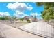 Charming single-story home featuring a secure fenced yard and well-lit driveway at 45 Prince Ln, Las Vegas, NV 89110
