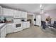 Functional kitchen and dining area showcasing updated appliances and an adjacent dining space at 45 Prince Ln, Las Vegas, NV 89110