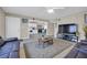 Spacious living room seamlessly connects to a modern, updated kitchen at 45 Prince Ln, Las Vegas, NV 89110