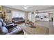 Inviting living room that flows seamlessly into the updated kitchen at 45 Prince Ln, Las Vegas, NV 89110