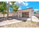 Covered patio area with concrete base, offering a shaded retreat with stone walk way to backyard at 45 Prince Ln, Las Vegas, NV 89110