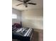 Comfortable bedroom with carpet flooring, offering a cozy personal space for relaxation and rest at 4834 E Van Buren Ave, Las Vegas, NV 89110