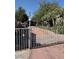 Charming home with gated entry, a spacious yard, and mature trees at 4834 E Van Buren Ave, Las Vegas, NV 89110
