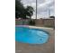 Backyard featuring a pristine in-ground swimming pool, perfect for enjoying the outdoors at 4834 E Van Buren Ave, Las Vegas, NV 89110