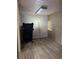Versatile room with wood-look floors and a treadmill, offering a great space for exercise or hobbies at 4834 E Van Buren Ave, Las Vegas, NV 89110