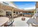 An outdoor covered patio area with dining and bar, perfect for entertaining guests at 603 Fiddlehead Ave, Las Vegas, NV 89183