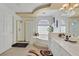Bright bathroom featuring a glass enclosed shower and soaking tub with dual sink vanity at 603 Fiddlehead Ave, Las Vegas, NV 89183