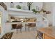 A dining area with a bar-style counter overlooking the living area provides seating for casual meals and entertaining at 603 Fiddlehead Ave, Las Vegas, NV 89183