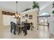 Beautiful dining room with a vaulted ceiling, stylish furnishings, and views of the outdoor area at 603 Fiddlehead Ave, Las Vegas, NV 89183