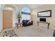Inviting living room featuring tile floors, neutral walls, and a comfortable seating area at 603 Fiddlehead Ave, Las Vegas, NV 89183