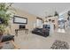 Spacious living room with vaulted ceilings, tile flooring, and ample natural light at 603 Fiddlehead Ave, Las Vegas, NV 89183