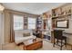 Bonus room featuring built-in shelving and comfortable seating at 611 Spyglass Ln, Las Vegas, NV 89107