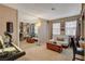 Versatile bonus room with built-in shelving, and comfortable seating at 611 Spyglass Ln, Las Vegas, NV 89107