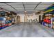 Spacious garage with ample storage shelving and room for bicycles and gear at 611 Spyglass Ln, Las Vegas, NV 89107