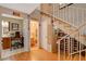 Hallway featuring staircase, bathroom, and decor at 611 Spyglass Ln, Las Vegas, NV 89107
