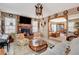 Inviting living room featuring a fireplace, TV, and comfortable seating at 611 Spyglass Ln, Las Vegas, NV 89107