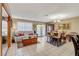 Inviting living area seamlessly connects to the dining area, showcasing an open and airy design at 611 Spyglass Ln, Las Vegas, NV 89107