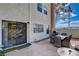 Outdoor space with a patio table set, grill, and easy access to the home's interior at 611 Spyglass Ln, Las Vegas, NV 89107