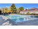 Community swimming pool with sparkling blue water at 611 Spyglass Ln, Las Vegas, NV 89107