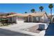 Charming single-story home with a tile roof, desert landscaping, and an attached two-car garage at 6508 Alpine Forest Ct, Las Vegas, NV 89149