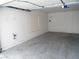 Spacious two car garage with concrete floor at 6508 Alpine Forest Ct, Las Vegas, NV 89149