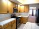 Kitchen features stainless steel appliances, granite countertops, and light wood cabinets at 6508 Alpine Forest Ct, Las Vegas, NV 89149