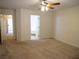 Large carpeted primary bedroom with ensuite bath at 6508 Alpine Forest Ct, Las Vegas, NV 89149