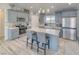 Stylish kitchen with stainless steel appliances and central island at 681 Indian Wells Ct, Pahrump, NV 89060