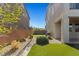 This backyard features low maintenance landscaping and artificial turf at 7364 Marbury St, Las Vegas, NV 89166