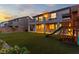 Expansive backyard featuring artificial turf, covered patio, and a fun playset for  at 7364 Marbury St, Las Vegas, NV 89166