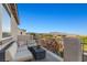 Outdoor seating on balcony with community view and playground at 7364 Marbury St, Las Vegas, NV 89166