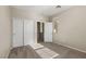 Bright bedroom with closet, window, carpet, and neutral walls, creating a cozy ambiance at 7364 Marbury St, Las Vegas, NV 89166