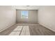 Bright bedroom with natural light, neutral carpet, and a window view at 7364 Marbury St, Las Vegas, NV 89166
