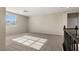 Upstairs loft with carpet flooring and natural light from a large window at 7364 Marbury St, Las Vegas, NV 89166
