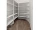Walk-in pantry offers ample storage with multiple shelves for organization and convenience at 7364 Marbury St, Las Vegas, NV 89166