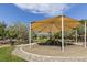 Gathering-friendly playground with sunshade, slides, and accessible design in a beautiful landscaped green space at 7364 Marbury St, Las Vegas, NV 89166