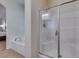 Spacious bathroom with soaking tub and glass enclosed shower at 768 Flowing Meadow Dr, Henderson, NV 89014