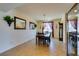 Elegant dining room featuring a chandelier, and large windows at 768 Flowing Meadow Dr, Henderson, NV 89014