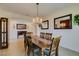 Elegant dining room featuring a chandelier, and fireplace at 768 Flowing Meadow Dr, Henderson, NV 89014