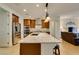 Open kitchen with granite countertops, an island with seating, and stainless steel appliances at 768 Flowing Meadow Dr, Henderson, NV 89014