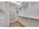 Organized walk-in closet with custom shelving and ample storage space, perfect for any wardrobe at 768 Flowing Meadow Dr, Henderson, NV 89014