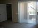 Bedroom with new carpet, sliding glass door and spacious closet at 833 Aspen Peak Loop # 2511, Henderson, NV 89011
