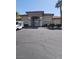 Attractive building exterior featuring stone accents, manicured landscaping, and ample parking at 833 Aspen Peak Loop # 2511, Henderson, NV 89011