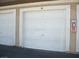 Attached single-car garage with a white door, providing secure parking and storage at 833 Aspen Peak Loop # 2511, Henderson, NV 89011