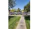 Scenic view of the street with lush landscaping and well-maintained parking areas at 833 Aspen Peak Loop # 2511, Henderson, NV 89011