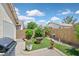 Inviting backyard with a built-in fire pit, artificial turf, and a barbecue area, ideal for outdoor living at 851 Offerman Ave, Las Vegas, NV 89123