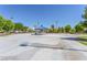 Community basketball court with a covered picnic area surrounded by mature trees and landscaping at 851 Offerman Ave, Las Vegas, NV 89123