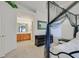 Bedroom featuring a canopy bed, leading to the Primary bathroom at 851 Offerman Ave, Las Vegas, NV 89123
